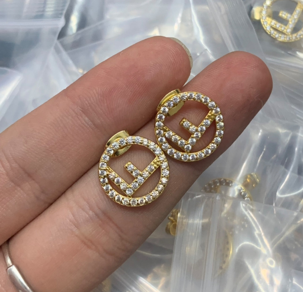 F Gold studs with stones